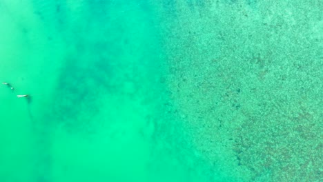 Boats-floating-in-azure-sea-water