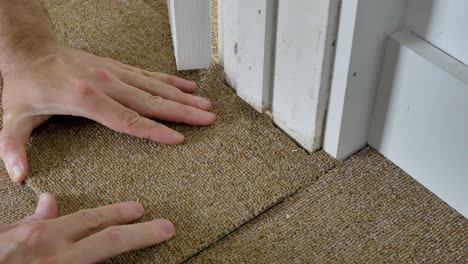 installing carpet tiles around a door frame