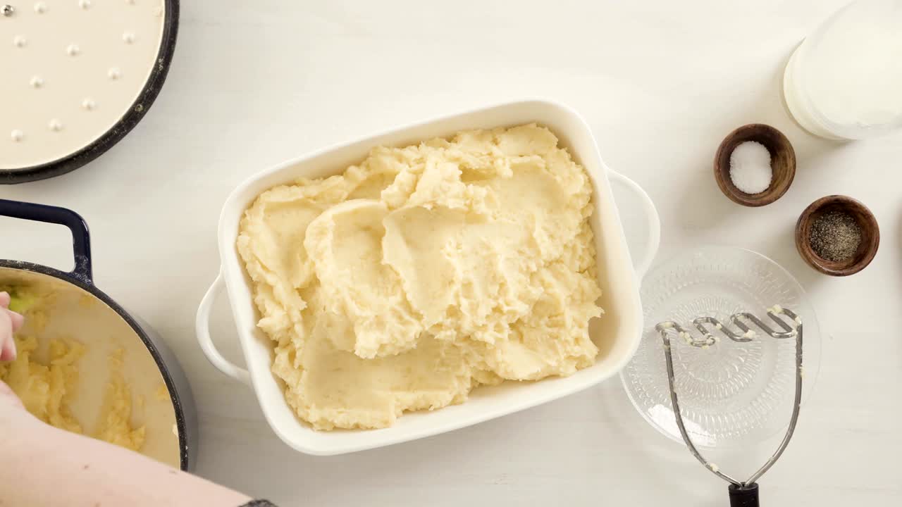 Preparing classic mashed potatoes for Thanksgiving dinner.