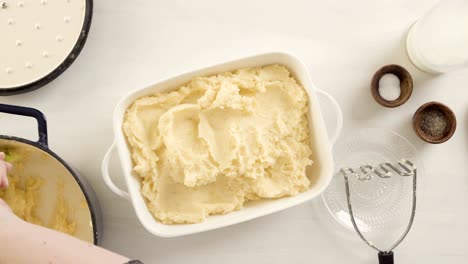 preparing classic mashed potatoes for thanksgiving dinner.