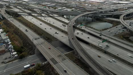 aerial lateral backwards shot of i15 freeway and 21 south street intersection in salt lake utah