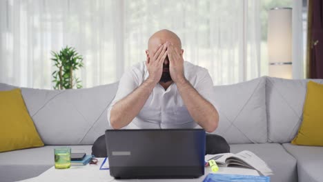 Home-office-worker-man-making-cute-gesture-at-camera.