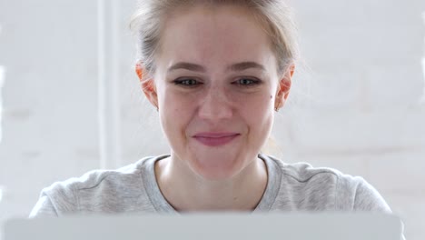 happy young woman cheering success of project