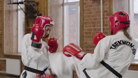 two athletes fighting indoors