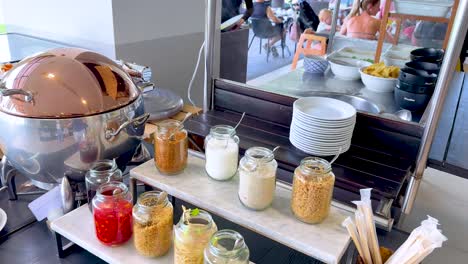 buffet with jars and dishes in bangkok