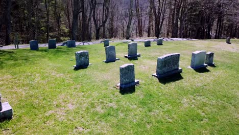 Aerial-flyover-of-tombstones-in-graveyard