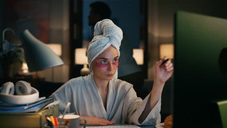 focused accountant texting home zoom on. woman counting calculating budget alone