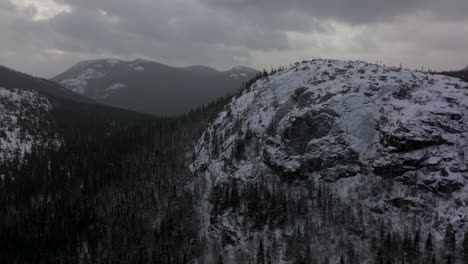 Winter-Scene-At-Mont-du-Lac-a-L'Empeche-On-A-Cloudy-Day-In-Quebec,-Canada---aerial-drone-shot