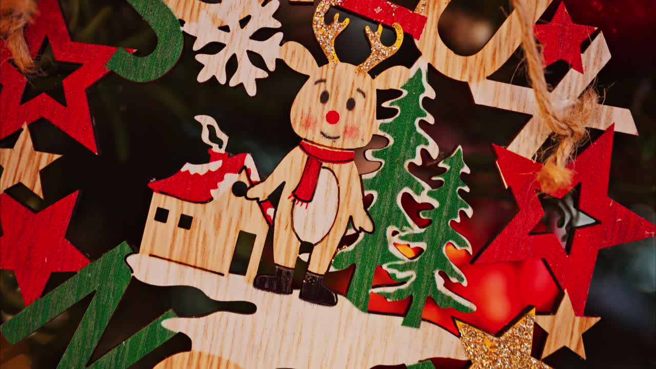 Close up of Christmas decorations and snow on a tree