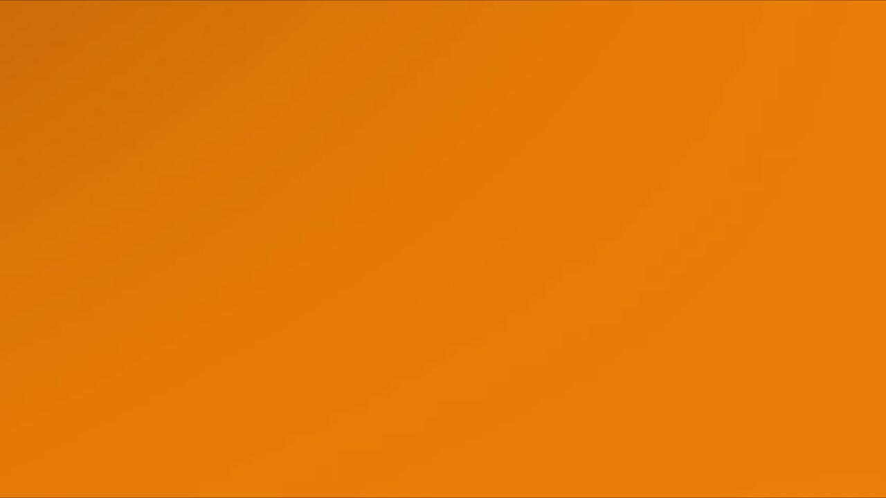 Abstrakt orange og sort gradient lysovergang