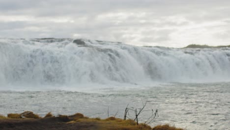 Stunning-slow-motion-view-of-a-scenic-waterfall-in-South-Iceland