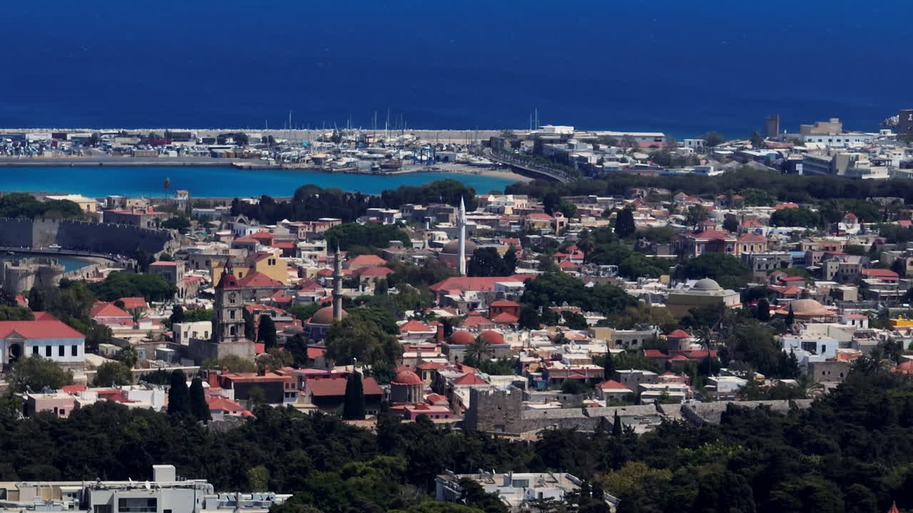 Telephoto aerial view of the cityscape of Rhodes city, sunny day in Greece