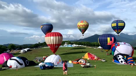 taitung, taiwan- july 5, 2022: balloons fly above, point of view shot from the ground