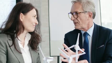 Business-talks-at-conference-table