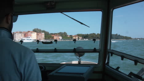 on a ferry from venice to the island lido