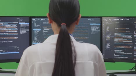 woman programmer working on code