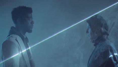 romantic multiethnic couple bonding in dark room with laser light