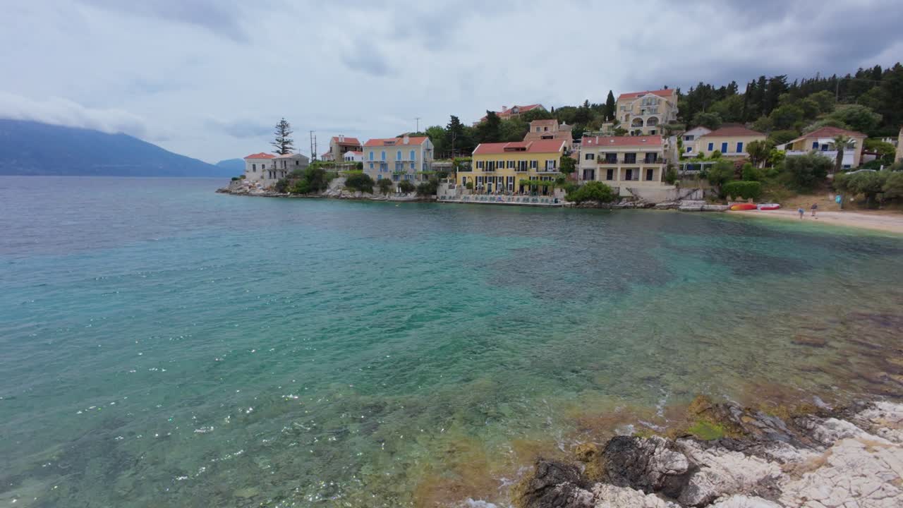 Beautiful small bay with clear water in Fiskardo, Kefalonia, Greece.