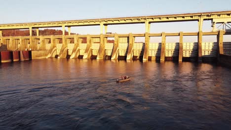 Close-up-slow-motion-view-of-the-water-flowing-in-Chickamauga-Dam,-Chattanooga-TN-on-a-sunny-day-in-USA