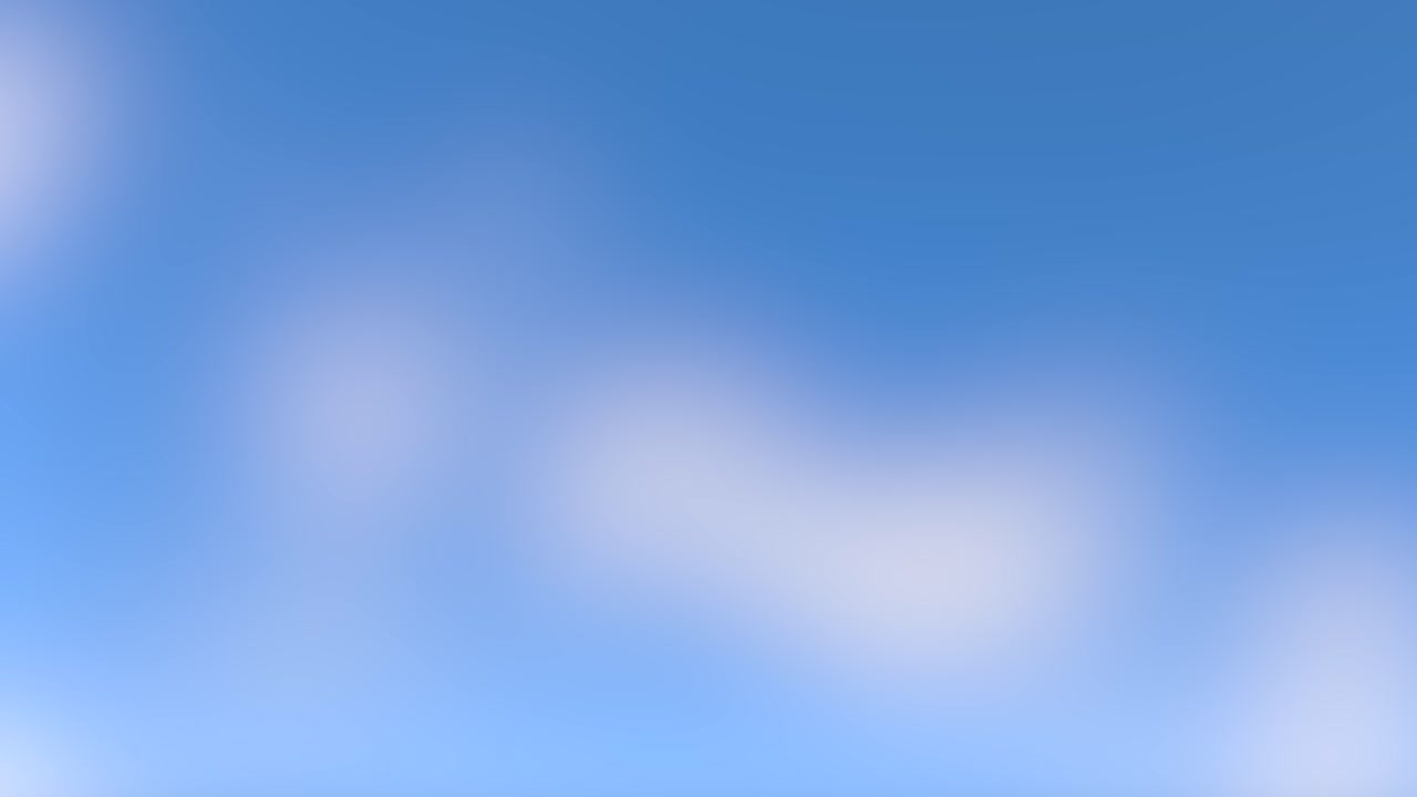 푸른 하늘을 가로질러 움직이는 흐릿한 구름