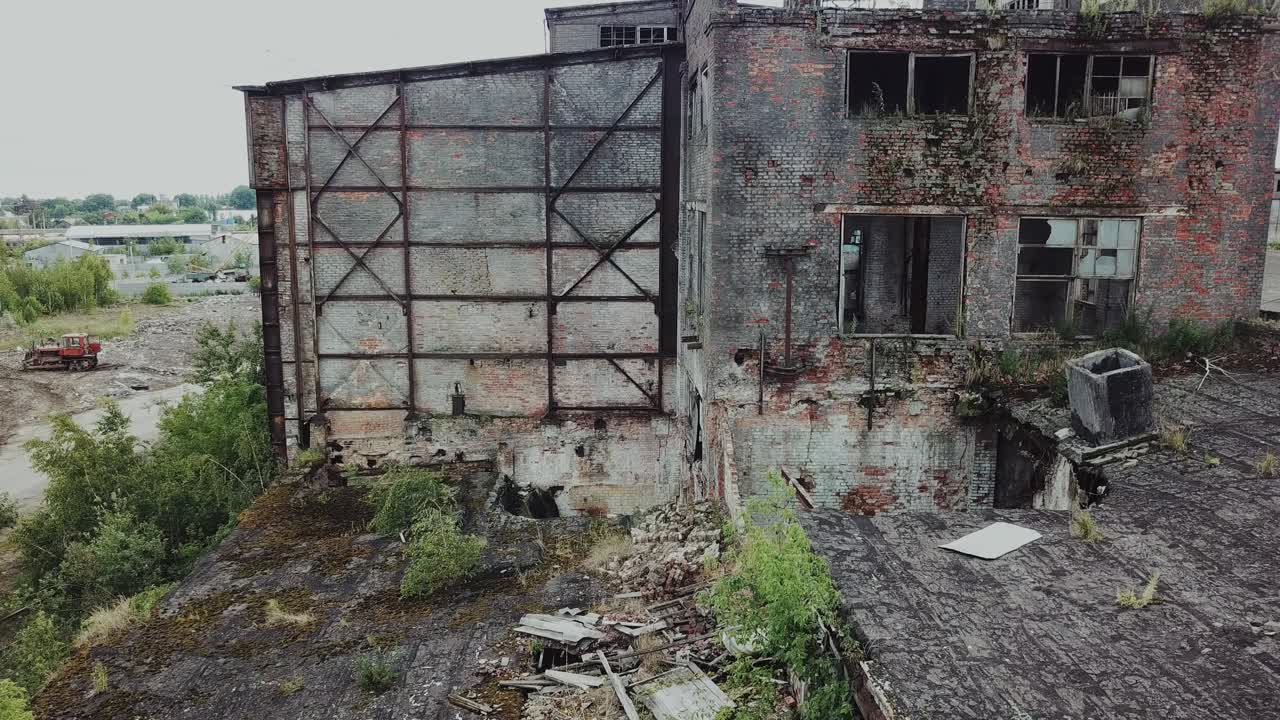 Aerial: Old Factory. Abandoned building exterior. Old factory building for demolition.