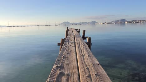 mini wooden jetty in pollensa majorca