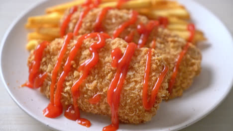 fried chicken breast fillet steak with french fries and ketchup