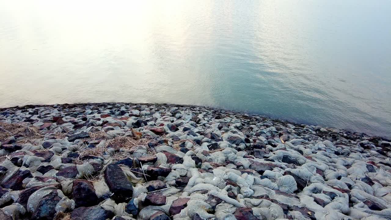 Sunset at Norderhafen (northern harbor) of the Nordstrand peninsula at the Wadden Sea National Park in Schleswig-Holstein, Germany, Europe