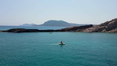 pedal boats sailing in paradise beach near the coast of the island kos