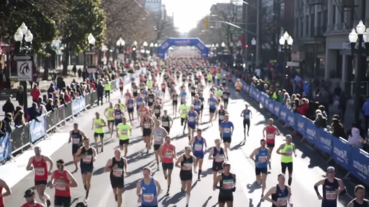 An Energetic Community Race: Runners Charge Through a Bustling City Street Surrounded by Spectators Cheering in a Sunlit Atmosphere