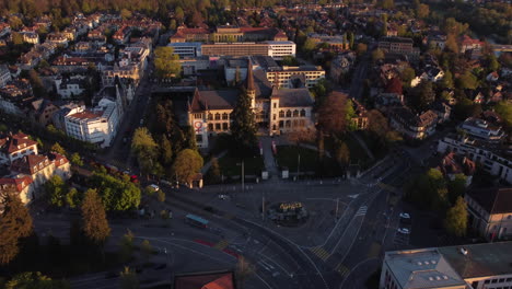 Slow-subject-rotate-shot-of-a-school-in-Bern,-Switzerland-at-sunset