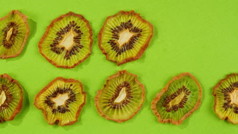 kiwi slices close up background of green, fresh fruit texture.