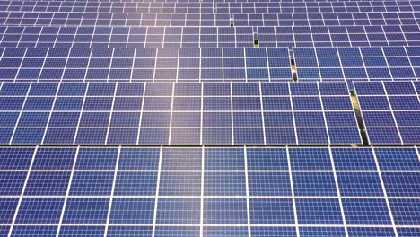 Closeup-of-surface-of-blue-photovoltaic-solar-panels-for-producing-clean-ecological-electricity