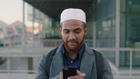 portrait-of-young-businessman-using-phone-texting-muslim-man-waiting-in-city