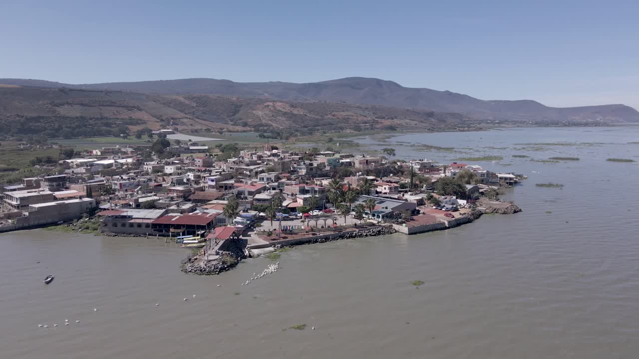 Flight over the small town of Petatan by the Chapala lake in Mexico