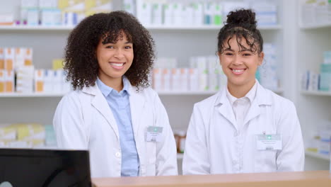 portrait of two proud and confident pharmacists
