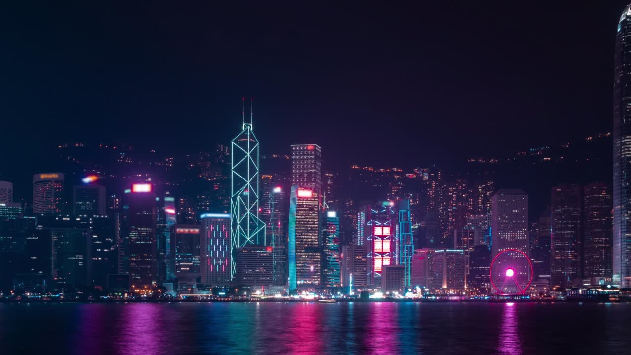 Hong Kong city twilight at night at riverside.