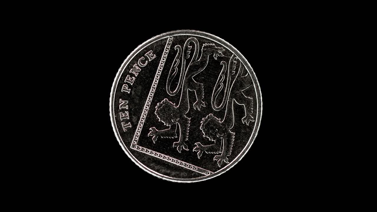 United Kingdom 10 pence 2014 reverse with Royal Shield lion segment, macro loop on black background