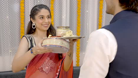 Indian-couple-doing-Karwa-Chauth-rituals