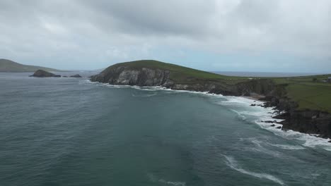 drone flying along dramatic coastline of kerry slea head drive early morning in ireland epic location