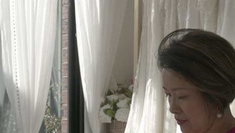 the lady is getting ready for her wedding, which is going to be a very special day for her