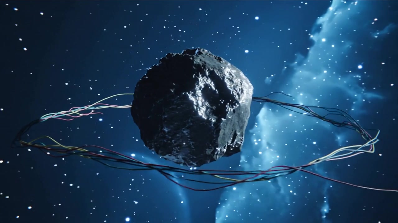 Rotating rock revealing facets as camera shifting closer in stars, wires orbiting nebula planet