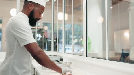 chef, man and roller with dough in restaurant