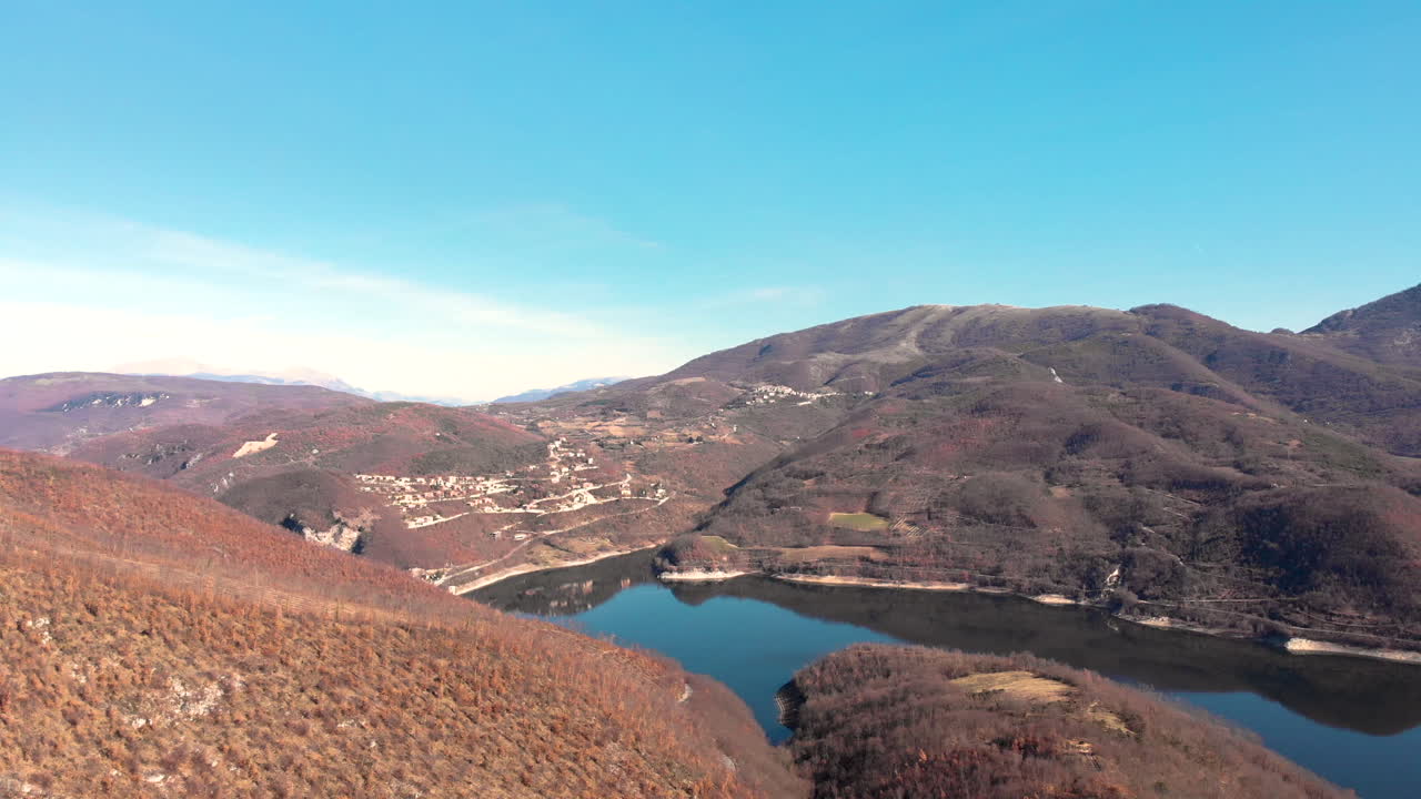 The beautiful quiet rocky  mountains and lake in Italy - aerial