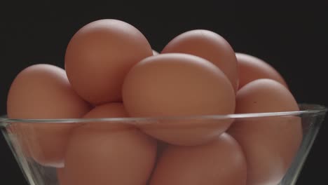 high proteins chicken eggs in the glass bowl rotating. proven health benefits of eating eggs