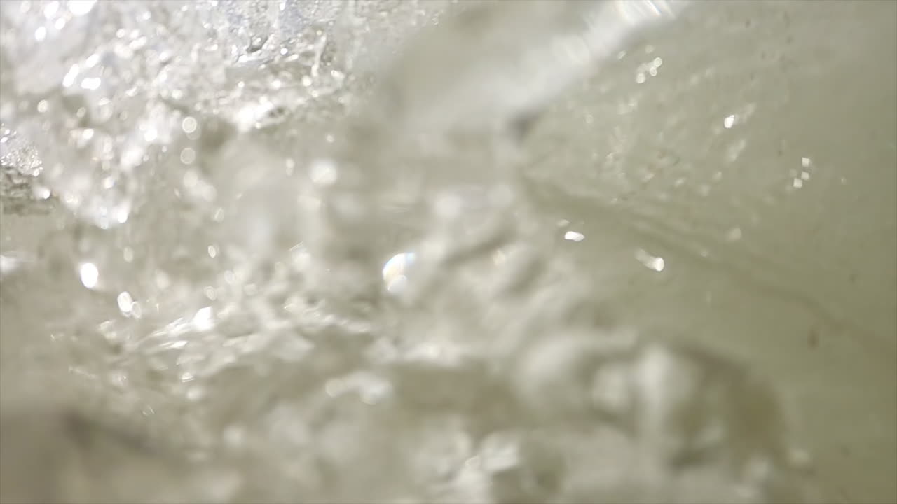 Man wearing swimming googles swimming in the sea