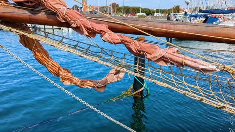 Old-Sailing-Ships-Moored-at-Berthing-in-a-Small-Harbor---Panoramic-Shot