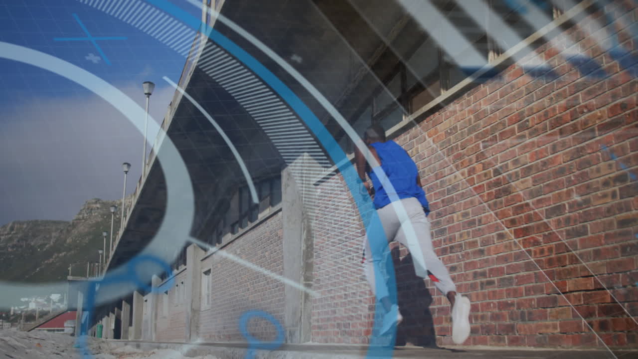 운동하는 아프리카계 미국인 남성 위에 디지털 인터페이스의 애니메이션