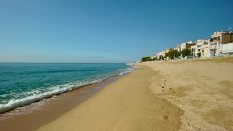 platja de les barques sea field maresme barcelona mediterranean coast plane close to turquoise blue transparent water beach without people