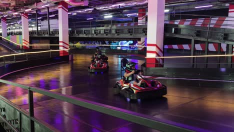 indoor go-karting track with people